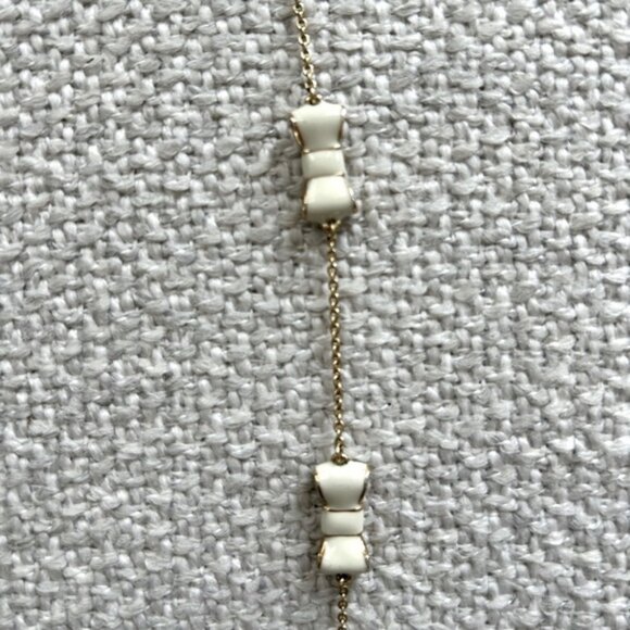 Kate Spade Take A Bow Long Scatter Gold Plated Necklace Cream Enamel 32 - Picture 3 of 5